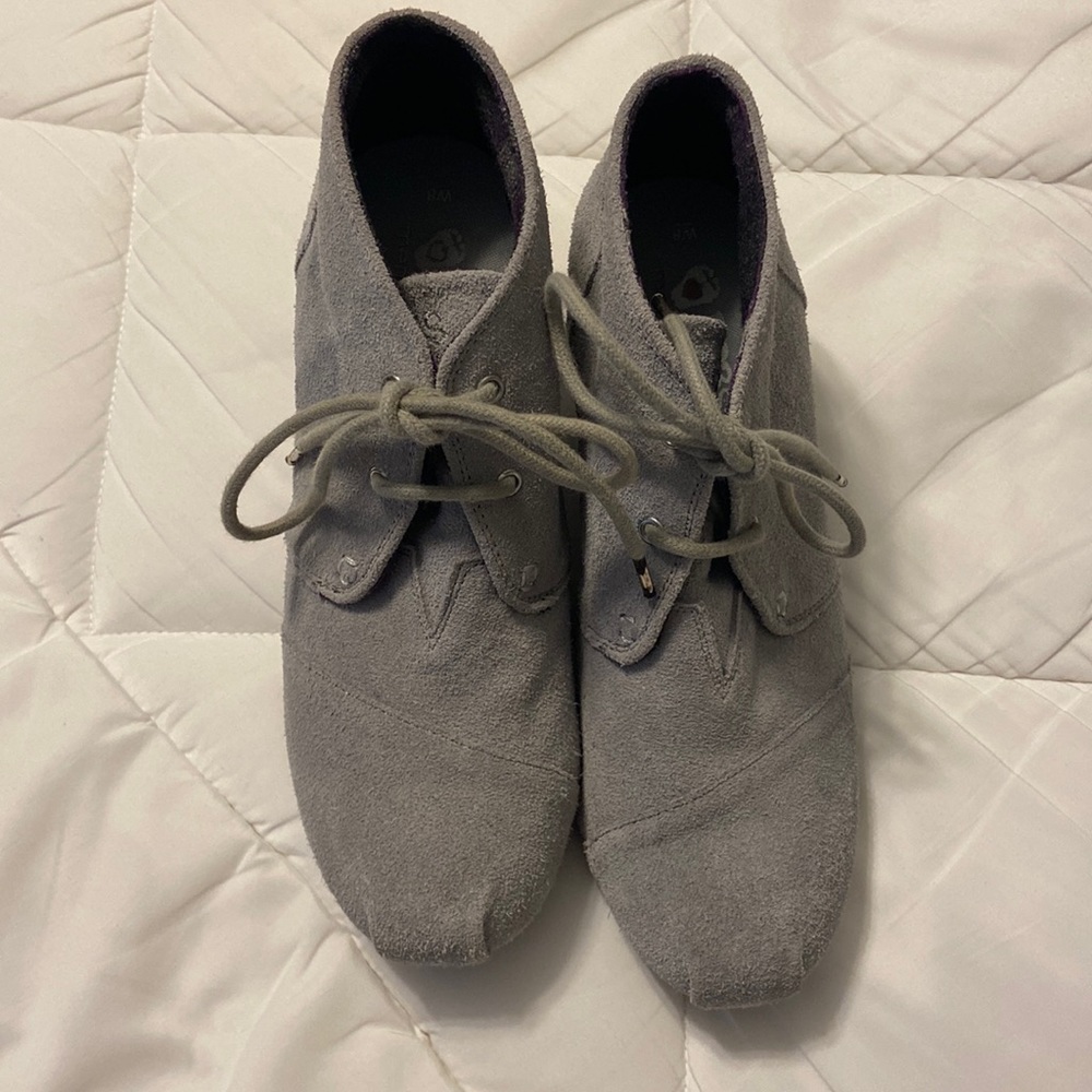 Woman’s gray boots